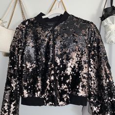 Size M Black Sequined Blazer For Spring, Black Sequined Outerwear For Party Season, Fall Sequined Outerwear For Night Out, Long Sleeve Sequined Outerwear For Fall, Winter Sequined Outerwear, Winter Long Sleeve Cropped Jacket For Night Out, Black Long Sleeve Outerwear For Party Season, Black Sequined Outerwear For Fall, Glamorous Winter Workwear Outerwear