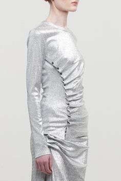 Silver lurex ruching with silver snap closures make up this stunning Rabanne Spring/Summer 2024 top, embodying the glamourous futurism of the brand. Charlotte Chesnais, Scarf Shirt, Shirts For Leggings, Cape Coat, Pleats Please Issey Miyake, Spring Summer 2024, Futurism, Paco Rabanne, Shirt Skirt