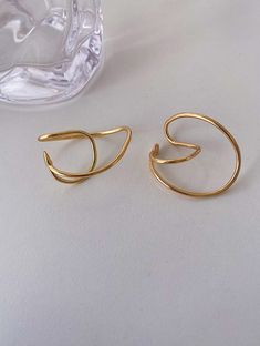 Inspired from the evolving planets, this abstract geometric ear cuff isthe newest must-have staple for those who loves art-deco ear cuffs.They give a unique look from different angles. Crafted in 18K gold/silver, suits all outfits and occasions.• S P E C I F I C A T I O N •Size: approx 36mm x 39 mmFinish: 18K PVD plati Couple Jewelry, Demi Fine Jewelry, Ear Cuffs, Love Art, Personalized Jewelry, Ring Earrings, Necklaces Bracelets, Ear Cuff, Silver Gold