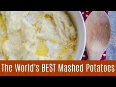 the world's best mashed potatoes recipe in a white bowl with wooden spoon