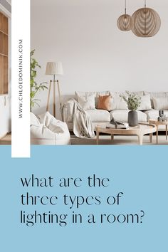 a living room with white couches and lamps hanging from the ceiling is featured in an article about what are the three types of lighting in a room?