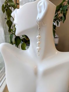 "This beautiful pair of earrings has silver wire and silver fish hook earring backs. They feature freshwater pearls, silver filigree beads, and a small faceted champagne Czech bead at the bottom. They were wire wrapped by hand and measures 2.875\" in length including a knotted wire detail at the bottom. I actually made this design as a custom order and loved it so much that I made an extra pair to offer in the shop! <3 All jewelry comes ready to gift in a white organza drawstring gift bag.  This Sterling Silver Round Bead Earrings With Pearl Drop, Elegant Silver Beaded Earrings Wire Wrapped, Elegant Silver Beaded Earrings With Wire Wrapping, Silver Beaded Earrings With Pearl Drop, Elegant Wire Wrapped Crystal Earrings With Round Beads, White Sterling Silver Nickel-free Chandelier Earrings, White Sterling Silver Chandelier Earrings Nickel Free, Elegant Wire Wrapped Round Crystal Earrings, Nickel-free White Sterling Silver Chandelier Earrings