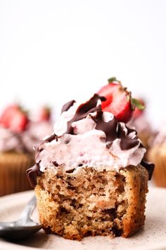 a close up of a cupcake on a plate