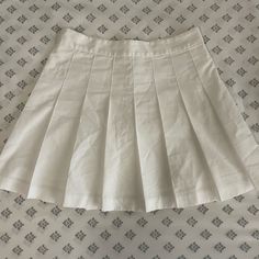 Color: White (Core Collection) This Is A High-Rise Pleated Micro Skirt With An Invisible Zip At The Back. It’s Cut From Super Soft Bi-Stretch Twill. Condition: Nwot! (No Flaws) Classic Cotton Mini Pleated Skirt, Classic Cotton Pleated Mini Skirt, Classic Pleated Cotton Mini Skirt, White High-waist Pleated Skirt, White Pleated High Waist Skirt, Classic Cotton Mini Skirt With Lining, Classic Cotton Lined Mini Skirt, Classic Cotton Skort With Lined Skirt, Classic Cotton Pleated Tennis Skirt