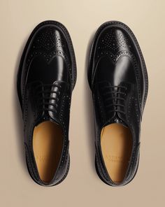 Upper: leather, Lining: 100% leather, Insock: full leather, Rubber sole, Clean with specialist shoe care products - High Shine Leather Derby Brogue Rubber Sole Shoe - Black | Men's Charles Tyrwhitt High Shine Derby Brogue Rubber Sole Shoe - Black Size 11 Leather Black Bridle Leather Shoes With Leather Sole, Wingtip Dress Shoes With Stitched Sole In Bridle Leather, Timeless Black Wingtip Derby Shoes, Timeless Black Wingtip Derby, Wingtip Oxfords With Rubber Sole In Bridle Leather, Wingtip Oxfords With Brogue Detailing In Bridle Leather, Wingtip Oxfords With Rubber Sole And Bridle Leather, Wingtip Bridle Leather Oxfords For Work, Wingtip Bridle Leather Oxfords With Rubber Sole