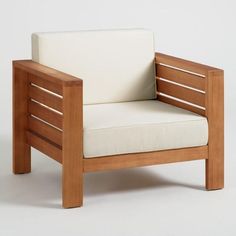 a wooden chair sitting on top of a white floor