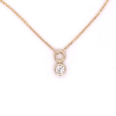 14k yellow gold diamond solitaire necklace. This 1mm diamond cut cable chain features a genuine .33 carat round brilliant bezel set diamond drop set below a solid stationary circle attached. Diamond quality is SI2 clarity G-H color. Chain length is 16 inches. Round Diamond Pendant, Diamond Pendants Designs, 3 Carat Diamond, 16 Inch Necklace, Solitaire Necklace, Handmade Fine Jewelry, Diamond Solitaire Necklace, Solitaire Necklaces, Bezel Set Diamond