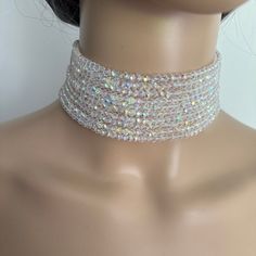 Shine bright like a diamond! Are you looking for a perfect choker? Stop here, I made it for you! Can't explain in words how obsessed I am with this crystals choker. I couldn't even catch in the photos the shine, exquisiteness and glamorousness of this necklace! I think is just perfect! I made it using 4mm shiny crystal beads and gold plated or platinum plated brass clasp.  Width: 4.5cm/1.7 inches  Dimensions:  Available lengths  - 13 inches - 13.5 inches  - 14 inches - 14.5 inches  - 15 inches - Party Crystal Necklaces, Sparkling Choker Necklace For Party, Dazzling Choker For Parties, Dazzling Choker For Party, Dazzling Party Choker Jewelry, Sparkling Party Choker Necklace, White Crystal Necklaces With Rhinestones For Party, Elegant Multi-strand Crystal Necklaces For Parties, White Crystal Necklace With Rhinestones For Party