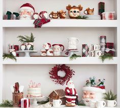 shelves with christmas decorations and figurines on them