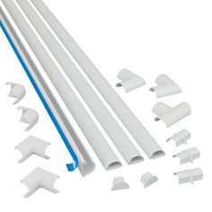 an assortment of white and blue plastic parts on a white background with clippings