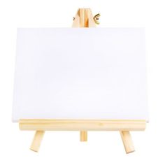 an easel with a white canvas on it, isolated against a white background photo