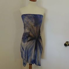 This Is A Brand New Love Tanjane Strapless Mini Dress Or Midi Skirt With Fold Over Waistband. Intentionally Raw Edges. Made Of A Soft And Stretchy Material. Blue, Black, And Tan Tie Dye. Measures 14.5 Inches Across The Bust And Is About 27.5 Inches In Length. Made In Southern California And Hand Dyed. Price Is Firm. Thanks For Looking. Sleeveless Lined Skirt Dress For Vacation, Sleeveless Vacation Dress With Lined Skirt, Vacation Midi-length Lined Dress, Vacation Midi Length Lined Dress, Blue Mini Strapless Dress For Vacation, Casual Fitted Blue Strapless Dress, Fitted Knee-length Strapless Dress For Vacation, Blue Bohemian Skirted Dress, Bohemian Blue Skirted Dress