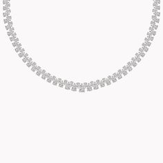 This MG exclusive is a decadent showcase of 24.00 carats of pear-shape diamonds handcrafted in 18K white gold. Dripping in glimmering diamonds, this stunning necklace defies all convention as it delicately drapes across the collar bone. Evoke timeless radiance with this showstopper. Elegant Rhinestone Tennis Necklace For Anniversary, Classic Diamond White Necklace With Rhinestones, Diamond White Diamond Cut Necklace For Evening, Dazzling Diamond Cut Necklace For Evening, Diamond Cut White Necklace For Evening, Classic Rhinestone Diamond White Necklace, Diamond Cut Diamond White Necklaces For Evening, White Gold Crystal Necklace For Evening, Diamond Cut Necklaces In Diamond White For Evening