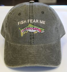 Do you love to Fly Fish? Or know someone who does? This is a perfect cap for any Dad, Grand-dad, Husband, or any man or women in your life. Cap Information- 100% cotton pigment dyed twill Unstructured, six-panel, low profile Self-fabric sweatband and six sewn eyelets All Embroidery is done at Dolce Embroidery Fish Fear Me, Buy Fish, Mia 3, Fishing Hat, Going Fishing, Fitness Inspo, Low Profile, Caps Hats, Accessories Hats