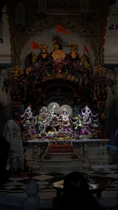 an idol is displayed in the middle of a room