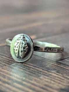 This ring is one of the first pieces I've made using my new 20 ton press.(yay  I formed the ladybug by melting scrap sterling silver, and pressing the silver in the die shown with my 20 ton hydraulic press. The band is sterling wire I rolled from melted scrap, and then hammered for texture. It's oxidized in the recessed areas, and tumbled for extra shine, as shown.  All sterling silver scrap used is 925 sterling silver, these are leftover pieces from Rio Grande Jewelry Supply, scrap wire ends an Aesthetic Couple Jewelry, Hippie Rings Silver, Silver Chunky Jewellery, Weird Rings Silver, Simple Ring, Silver Sterling Silver Punk Rings, Silver Rings Aesthetic, Ladybug Ring, Metal Rings Handmade