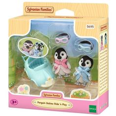 the penguin family playset includes two penguins and one baby penguin in a stroller