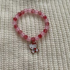 Pink And Red Flower Hello Kitty Charm Bracelet Hobby Lobby Bracelet Beads, Cute Hello Kitty Gifts, Hello Kitty Stuff Accessories, Hello Kitty Bracelet Ideas, Pink Christmas Wishlist, Small Christmas Gifts For Friends, Red Bracelet Ideas, Hello Kitty Gift Ideas, Flower Hello Kitty