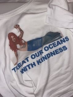 a t - shirt with an image of a woman on it that says treat our oceans with kindness