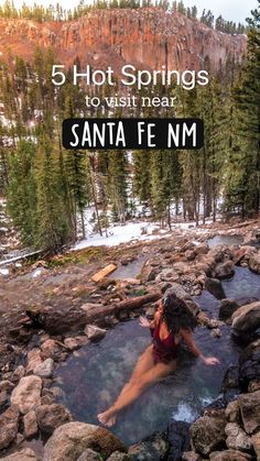 a woman in a hot tub with the words 5 hot springs to visit near santa fe nm