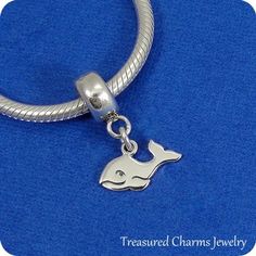 This Whale Charm comes with a silver dangle bead as pictured.  Fits on all major brand European style bracelets. A list of compatible chains is available here: https://etsy.me/2BY7DAW{ DETAILS }★ Material: .925 Sterling Silver★ Finish Color: Silver ★ Dimensions: One-sided★ Charm Size:  1/4" x 1/2"★ Bead Size: 3/16" x 1/4"★ Bead Hole Diameter: 5.5mm★ Bead fits most European style BraceletsPhoto is not to scale and may appear larger to show detail. Refer to exact measurements above.  Bead has a di Silver Dangle Charms For Everyday, Everyday Silver Dangle Charms, Silver Charm Bracelet With Lobster Clasp And Round Beads, Adjustable Silver Dangle Charms, Sterling Silver Charm Bracelet With Removable Dangle Charms, Adjustable Sterling Silver Charms With Dangling Details, Sterling Silver Charm Bracelet With Removable Charms, Sterling Silver Dangle Charm Bracelet With Removable Charms, Sterling Silver Charm Bracelet With Round Beads