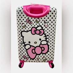 Sanrio Hello Kitty Hard Shell Rolling Carry-On Luggage Suitcase. Measuring 21 Inches In Size, This Suitcase Is Perfect For Carry-On Luggage. With The Iconic Hello Kitty Logo Proudly Displayed, It's Sure To Make A Statement Wherever You Go. Don't Miss Out On This One-Of-A-Kind Suitcase, Perfect For Any Hello Kitty Fan. Hello Kitty Hello Kitty Luggage Hello Kitty Suitcase Luggage Suitcase Sanrio Hello Kitty Luggage Suitcases, Pink Rectangular Luggage, Pink Hello Kitty Travel Bag, Travel Rectangular Bag With Hello Kitty Print, Pink Luggage With Luggage Sleeve For Daily Use, Pink Hello Kitty Rectangular Bag, Pink Rectangular School Luggage, Hello Kitty Luggage, Hello Kitty Suitcase