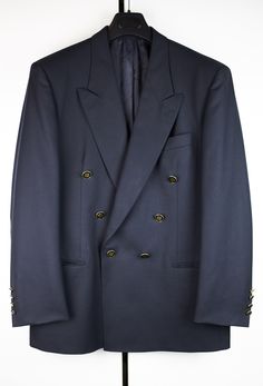 I offer Pierre Balmain dark navy blue double-breasted wool blazer CONDITIONS Used, vintage, therefore has some signs of wear, has minor imperfection - hook on the sleeve, see photos, pretty good condition in general. Size tags are missed, size around L PLEASE NOTE Vintage item, some signs of wear are expected.  I always make a lot of high quality photos. Please carefully look and zoom pictures and read description till the end All sales are final, returns or exchange accepted folloving shop's po Navy Double-breasted Formal Outerwear, Navy Double-breasted Outerwear For Formal Occasions, Formal Navy Double-breasted Outerwear, Formal Navy Double-breasted Pea Coat, Formal Peacoat With Double Button Closure, Navy Double-breasted Wool Blazer, Classic Blue Double-breasted Peacoat, Classic Navy Double-breasted Peacoat, Navy Formal Blazer With Double-breasted Button