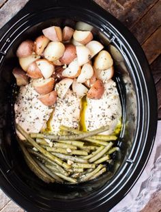 chicken, potatoes and asparagus in a slow cooker