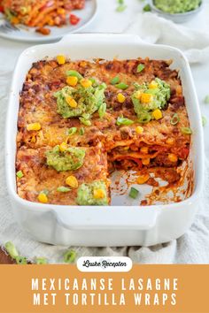 mexican lasagna met tortilla wraps in a white casserole dish