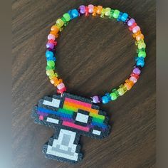 Handmade Perler/Kandi Necklace. Choker Style Length. Perfect For Your Next Beyond Wonderland Festival! Barbie Kandi, Kandi Choker Tutorial, Mushroom Kandi, Scenecore Aesthetic Outfit, Kandi Necklaces, Kandi Choker, Rave Perler Necklaces, Kandi Necklace Choker, Nocturnal Wonderland Kandi