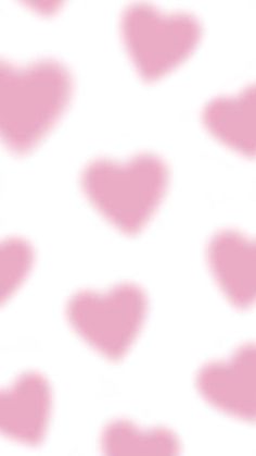 a white and pink background with lots of hearts in the shape of small heart shapes