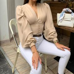 Length (cm) Bust Size (cm)  Waist  (cm) Hip  (cm) Size(cm) XS - - - - - S 67 92 67 - - M 67.5 96 67.5 - - L 68 100 68 - - XL 68.5 104 68.5 - - XXL - - - - - 3XL - - - - - Size measured by ourselves, sometimes has some errors, but always within 3cm. Free ShippingReceiving Time = Processing time (3-7 days) + Shipping time (12-40 days) Trendy V-neck Top With Buttons, Chic V-neck Top With Buttons, Beige V-neck Solid Color Blouse, Beige V-neck Solid Blouse, Beige V-neck Blouse Solid Color, Beige Solid Color V-neck Top, V-neck Tops With Buttons, Trendy Beige V-neck Blouse, Beige V-neck Blouse With Buttons