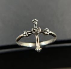 Cross Ring * 925 Solid Silver Ring * Dainty Cross Ring * Sideways Cross Sterling Silver Ring * Christian Ring * Gift Idea * Catholic Gift Prodate Detail Ring Size: 3 To 16 Size Available Shop Name : AkSemiPreciousStone Why Wear Silver As a metal, silver has significant health benefits that have been used across cultures for centuries. Silver has a proven track record as a powerful antimicrobial agent fighting infections and aiding in cold and flu prevention, wound healing, and more. Silver also helps with internal heat regulation and circulation. You can rush your order by contacting us to see if we can meet your deadline. Upon checkout, priority and express shipping options are also available in the drop down menu. This does not change production times. O T H E R ∙ I N F O R M A T I O N * White Gold Cross-shaped Promise Ring, Adjustable Cross-shaped Ring For Anniversary, Sterling Silver Cross Ring Symbolic Style, Sterling Silver Cross Ring For Promise, Symbolic Sterling Silver Cross Rings, Adjustable Cross-shaped Promise Ring, Sterling Silver Cross Ring, Christian Ring, Natural Turquoise Stone