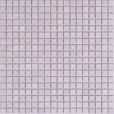 a white tile wall with small squares on the bottom and one square in the middle