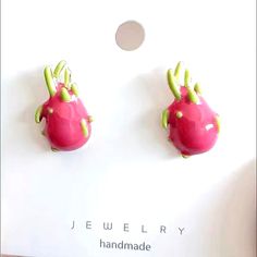 Indulge in the tropical allure of these stunning Dragon Fruit Stud Earrings! Handcrafted with love and attention to detail, these earrings are perfect for fruit enthusiasts and fashion-forward individuals looking to add a touch of whimsy to their style. Each earring features a miniature replica of the vibrant dragon fruit, meticulously crafted to capture its exotic beauty. Fruit Design Drop Earrings As Gift, Fruit Design Drop Earrings For Gift, Green Fruit Design Earrings As Gift, Gift Green Earrings With Fruit Design, Green Fruit Design Earrings Gift, Green Fruit Design Earrings For Gifts, Multicolor Fruit Design Earrings For Gift, Trendy Green Earrings With Fruit Design, Trendy Pink Fruit Design Earrings