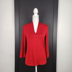 Nwt Talbots Red 3/4 Sleeve V-Neck Top Size Small 95% Rayon & 5% Spandex 101723 Measured Size. Measurements Taken Flat. Measurements Are Approximate. Armpit To Armpit 18" Waist 16.5" Length 24" Red Stretch Tops With 3/4 Sleeves, Red 3/4 Sleeve Tops For Work, Black Glitter Top, Petite Cardigan, Yellow Floral Blouse, Striped Peplum Top, Blue Button Up Shirt, Blue Floral Top, Cotton Pullover