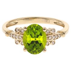 Stunning, timeless and classy eternity Unique ring. Decorate yourself in luxury with this Gin & Grace ring. This ring is made up of 7X9 Oval-Cut Prong Setting Genuine Peridot (1 pcs) 2.0 Carat and Round-Cut Prong Setting Natural Diamond (16 pcs) 0.08 Carat accent stones for a lovely design. This ring is weight 2.10 grams. The ring is crafted of shining 10-karat Yellow Gold and is completed by a highly polished finish. August Birthstone Ring, Zodiac Leo, Fine Ring, Jewels Rings, August Birthstone, Ring With Diamond, Peridot Ring, Wedding Rings Vintage, Cubic Zirconia Rings