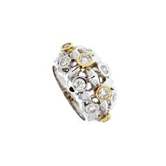 This is an 18KT elegant Bezel Set White & Yellow Gold Diamond Ring . The total diamond weight is 0.86 carats, with SI quality and H color. 13mm wide on Top, and the ring is a size 6.50 Bezel Set Diamond Ring, Yellow Gold Diamond Ring, Bezel Set Diamond, Gold Diamond Ring, Bezel Setting, Diamond Rings, Yellow White, Diamond Jewelry, Gold Diamond