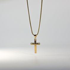 Proclaim your love and believe in Christianity in the most sophisticated way. Highlight the power of your faith in Jesus Christ and His sacrifice through this 14K solid gold cross pendant. The minimalist cross pendant exquisitely represents the long-standing Christian faith through its elegant finish. Finely cut edges showcase utmost precision, giving the cross pendant a neat appeal that is captivating to the eyes. 100% tarnish-free, this solid gold pendant will shine as radiant as your faith in Gold Cross Pendant Necklace With Box Chain, Gold Cross Necklace With Box Chain, Crucifix Cross Necklace With Box Chain As Gift, Crucifix Necklace With Box Chain For Gift, Box Chain Crucifix Necklace For Gift, Crucifix Box Chain Necklace As Gift, Classic Gold Crucifix Cross Necklace, Crucifix Cross Necklace With Box Chain, Elegant Cross Necklace With Box Chain