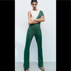 Zara Long Flowy Jumpsuit Stretch, Size S Can Fit For M Too Beautiful Casual Asymmetrical Jumpsuits And Rompers, Chic Green One-shoulder Jumpsuits And Rompers, Green Stretch Bodysuit By Zara, Zara Green Stretch Bodysuit, Summer Asymmetrical Stretch Jumpsuits And Rompers, Spring Jumpsuits And Rompers With Asymmetrical Neckline, Spring Jumpsuits With Asymmetrical Neckline, Chic Asymmetrical Fitted Pantsuit, Zara Green Fitted Bodysuit