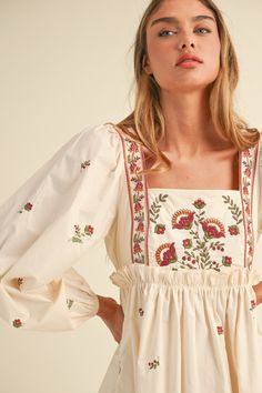 Get ready to bloom in style with our Floral Embroidered Babydoll Dress! This long sleeve poplin mini dress features delicate floral embroidery and a premium quality design. The back invisible zipper and lining add comfort and convenience. Perfect for a fun and flirty look! Embroidered Dress Designs, Japan Clothing, Thrift Wishlist, Embroidered Denim Dress, Fashion Factory, Cute Vacation Outfits, Inheritance Games, Japan Outfit, Dress Embroidery