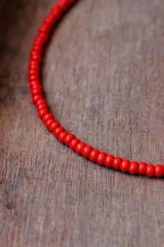 Bright minimalist beaded choker with red czech glass beads, strong double nylon thread, silver tone clasps, silver tone lobster clasp and stainless steel adjustable length chain. Perfect for everyday wear or a pretty gift for someone special! You can wearing it with other chokers, chain necklaces or alone! Total length of necklace is 43 cm or 16.9 inches and 4,5 cm of adjustable length chain. NOTE: in my store you can also find similar necklaces in other colors as in the last photo. The price is Minimalist Red Beaded Necklaces, Minimalist Red Beaded Necklace, Adjustable Red Choker With Round Beads, Adjustable Red Choker With Tiny Beads, Red Minimalist Beaded Necklace With Tiny Beads, Minimalist Red Beaded Necklace With Tiny Beads, Red Minimalist Beaded Necklace, Adjustable Red Choker For Beach, Adjustable Single Strand Red Beads