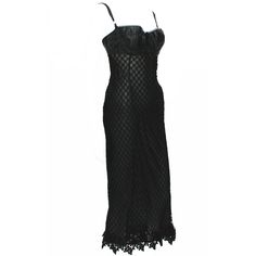 DOLCE & GABBANA Super Sexy Bustier Lace Dress Italian Size - 44 Black Knitted Stretch Lace, Black Sheer Lining Measurements for the dress approx. : bust - 37" + stretch and extra hook and eye, waist - 28/30", hips - 32/34" + stretch. A Similar Dress Was Worn by MADONNA in 1997. Made in Italy New without tag. Black Flapper Dress, Sheer Black Dress, Jersey Evening Dress, Dress Italian, Velvet Evening Dress, Black Sheer Dress, Italian Dress, Bodycon Cocktail Dress, Black Bustier