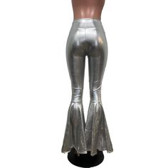 "**Due to SO MANY issues with USPS - we STRONGLY ENCOURAGE you to purchase the UPS Upgrade with your order located here: https://www.etsy.com/listing/926751536/ups-upgrade Made of shiny silver metallic spandex - these high-waisted bell bottoms will fit you perfectly. They hug your hips and flare out at the feet. The standard inseam is 34\" (the mannequin is 5'8\") but can be customized by putting your desired inseam in the comments/notes when checking out. Women's Sizing (See below for instructi High Waist Pants For Spring Concerts, Stretch Bottoms For Spring Concert, Spring Stretch Bottoms For Concert, Spring Concert Fitted Pants, Fitted Pants For Spring Concert, Stretch High Waist Pants For Concert, High Waist Stretch Pants For Concert, Retro Bottoms For Night Out In Spring, Retro Bottoms For Spring Night Out