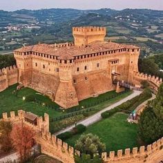 an aerial view of a castle in the countryside