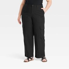 Elevate your wardrobe for casual outings with these Mid-Rise Utility Cargo Pants from Universal Thread™. Designed in a straight-leg silhouette, the mid-rise cargo pants are made from soft, stretchy twill fabric to keep you in absolute comfort. A fly button and zipper closure with belt loops provides you a secure fit, while side, back, flap and cargo pockets allow you to carry small everyday essentials. Wear it with your choice of tops to create a range of versatile outfits. Universal Thread™: Fo Utility Cargo Pants, Versatile Outfits, Beach Pants, Hem Style, Twill Fabric, Bottom Clothes, Universal Thread, Pull On Pants, Straight Pants