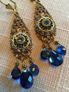 Europeen Brass Filigree Pendant with Vintage Swarovski Deep Blue Crystal Earrings. Kashmir Blue Quartz Briolettes. Leverback Closure.   Size   :     2  3/4 inches    (7cm) Blue Pierced Drop Chandelier Earrings, Blue Jeweled Dangle Jewelry, Elegant Jeweled Blue Crystal Earrings, Blue Nickel-free Elegant Chandelier Earrings, Elegant Blue Jeweled Crystal Earrings, Elegant Blue Nickel-free Chandelier Earrings, Elegant Blue Jeweled Earrings, Blue Teardrop Jeweled Jewelry, Blue Jeweled Dangle Crystal Earrings