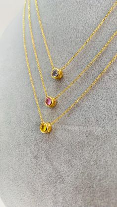 ✨ Enjoy a special 35% discount till CYBER MONDAY ! ✨  Free express shipping plus two gifts: a jewelry cleaner and organizer box. Don't miss out!  Discover elegance with our exclusive collection of 18k gold sapphire necklaces! Featuring stunning bezel-set sapphires in light blue, fancy pink, and fancy yellow, each piece is designed to add a touch of sophistication to any outfit. Perfect for any occasion, these necklaces offer timeless beauty and unmatched quality. Shop now to elevate your jewelry Silver Pink Sapphire Necklace For Gift, Silver Pink Sapphire Necklace Gift, Yellow Sapphire Jewelry As A Gift, Pink Necklace With Bezel Setting For Gift, Pink Sapphire Round Necklace For Gifts, Pink Sapphire Gemstone Necklaces For Gifts, Pink Sapphire Pendant Necklace As Gift, Pink Sapphire Gemstone Necklace Gift, Pink Sapphire Pendant Necklace For Gift