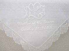 "Lovely white wedding handkerchief personalized with interlocking 3-initial monogram, Mother of the Bride and your wedding date.  Machine Embroidery What an exquisite wedding handkerchief for the Mother of the Bride/ Mother of the Groom or the entire wedding party! Color of Handkerchief Shown: white Embroidery color shown:  Pastel Blue Handkerchief Size~~Approx. 11\"x11\" Please include the following personalization information in the \"Message to Seller\" during the checkout process: 1. Initial Elegant Personalized Handkerchiefs For Bridal Shower, Personalized Elegant Handkerchiefs For Bridal Shower, Classic Personalized Wedding Handkerchiefs, Elegant Personalized Wedding Handkerchiefs, Elegant Customizable Wedding Handkerchiefs, Elegant Customizable Handkerchiefs For Personalized Gifts, Elegant Wedding Handkerchiefs Customizable, Elegant White Handkerchiefs For Personalized Gift, Elegant Customizable Handkerchiefs For Bridal Shower