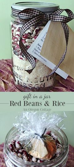 a jar filled with red beans and rice sitting on top of a bed next to another jar